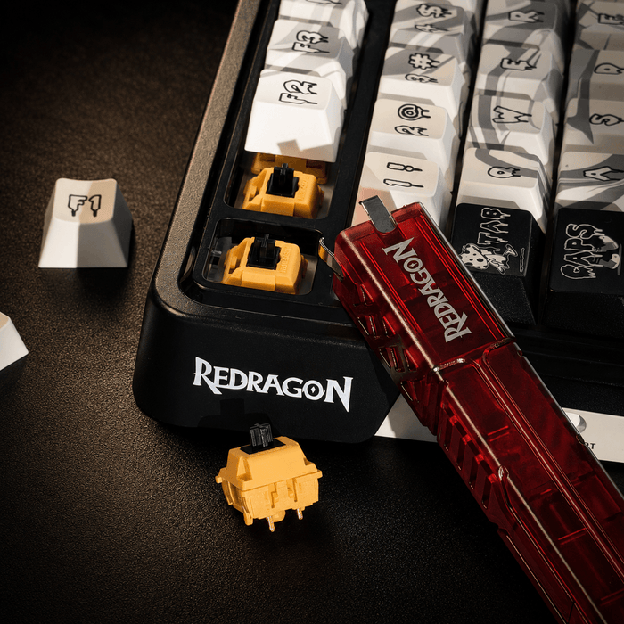 Redragon 2-in-1 switch puller and keycap puller tool for mechanical keyboards, designed for removing switches and keycaps easily.
