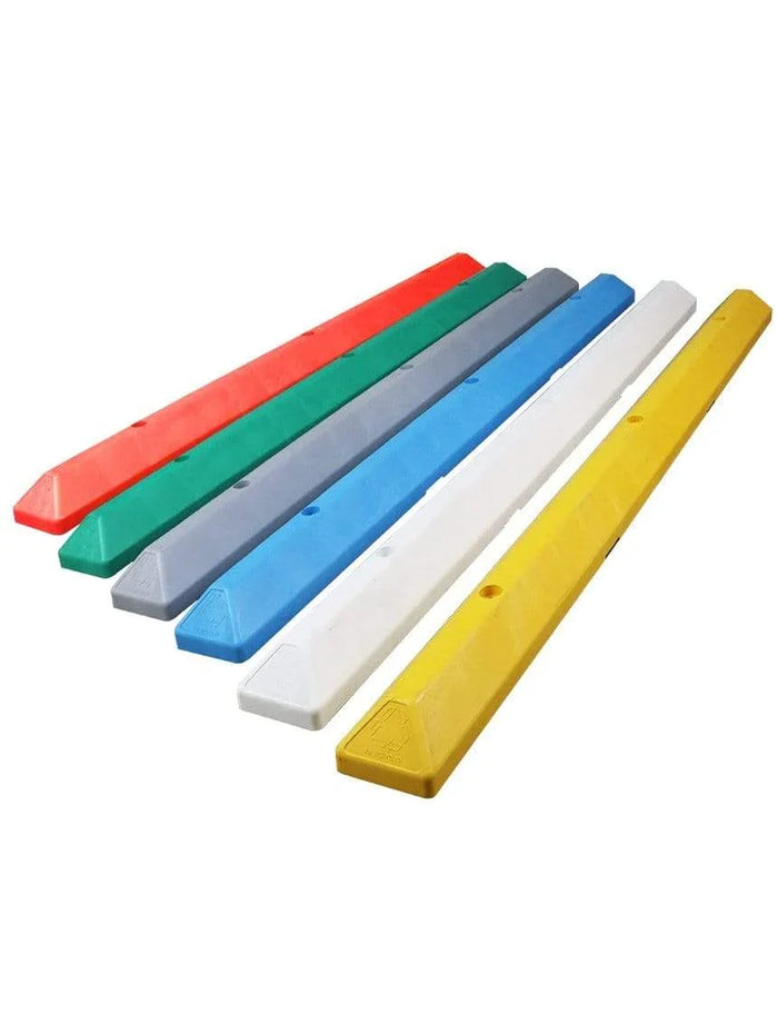Commercial parking lot wheel stops in multiple colors, durable parking blocks