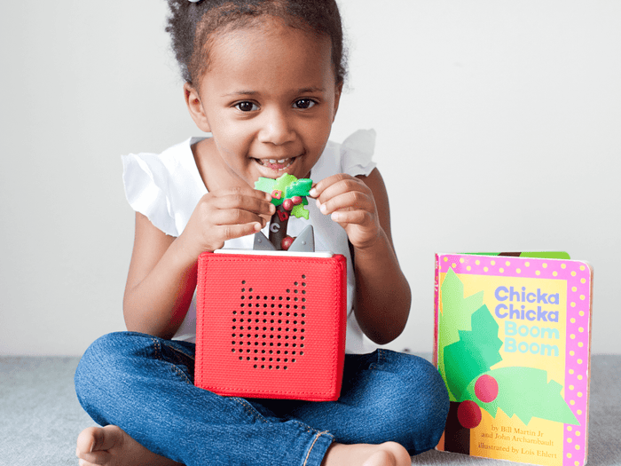 Child Playing With Chicka Chicka Boom Boom Tonie