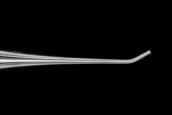 Dewin Flickmate Biopsy Holding Pipette for No-Laser Blastocyst Biopsy. Black background
