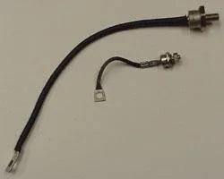 Power facility diode rectifiers with attached wires on a plain background
