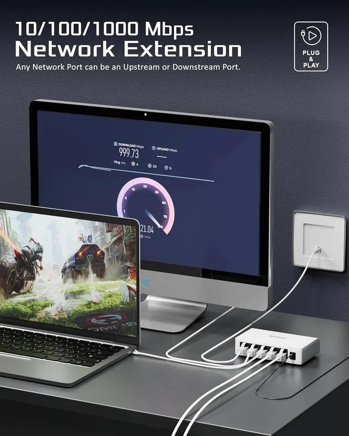 Network extension device with computer and laptop on a desk