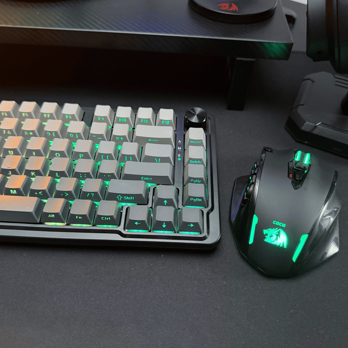 Gaming keyboard and mouse set with RGB lighting on a dark surface