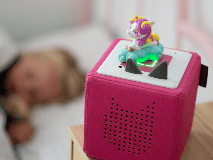 Child Playing With Moshi- Fluttercup Tonie Audio Figurine And Toniebox 2