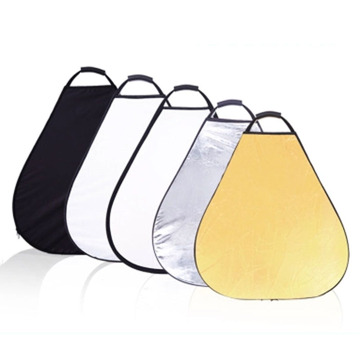 A set of triangle-shaped photography reflectors in gold, silver, white, black, and translucent colors, displayed in a row with a carrying case.