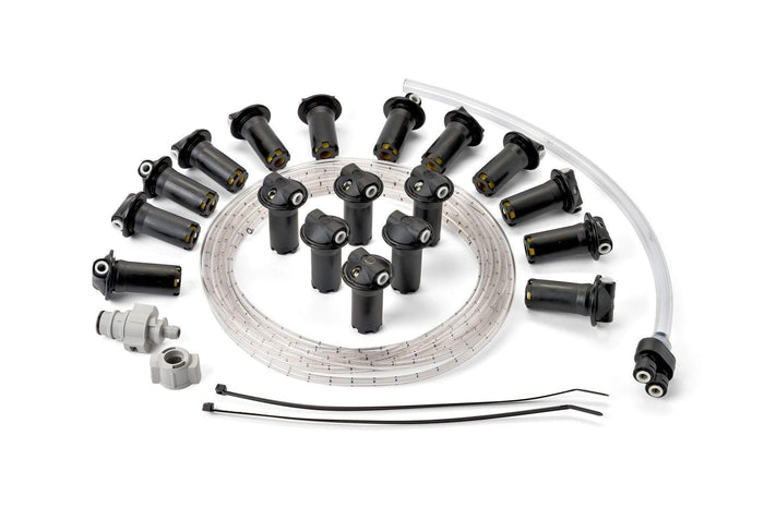 Single point battery watering system kit with tubing and connectors on white background