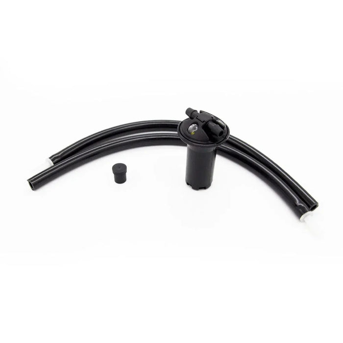 Stealth valve retrofit kit with black hoses and valve component on white background
