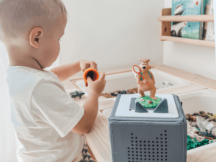 Child Playing With The 7 Habits Of Happy Kids Tonie