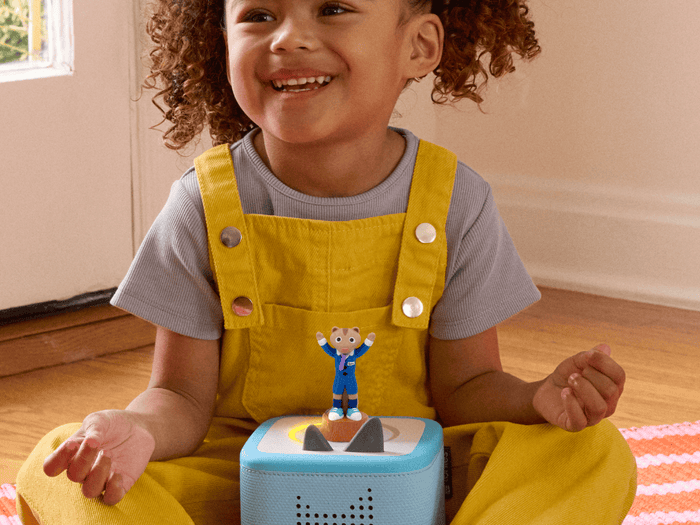 child playing with a toniebox 2 and Laurie Berkner 3- Harry The Chipmunk's Treasure Hunt Tonie