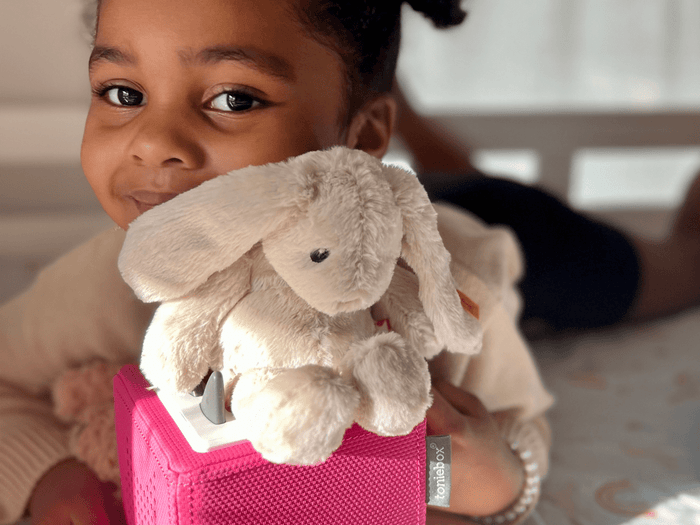 Child Playing With Hoppy Rabbit Audio Figurine And Toniebox 2